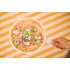 Photo with Easter egg sprinkler in pan with Easter eggs and yellow and white background.